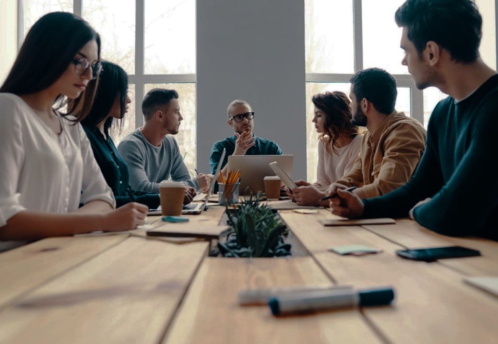 internal staff meeting of new office hires