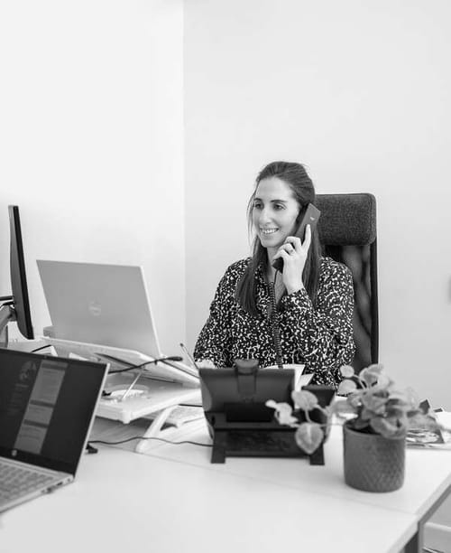 talent seeker on phone with business looking to hire