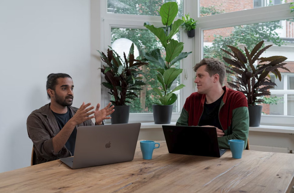two men having a meeting